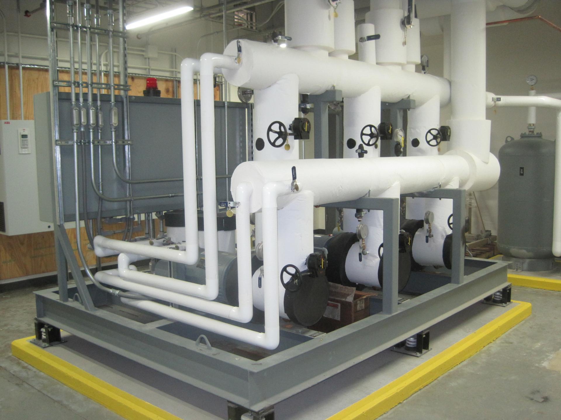 Skid mounted redundant pump package is makes efficient use of the available mechanical room space.
