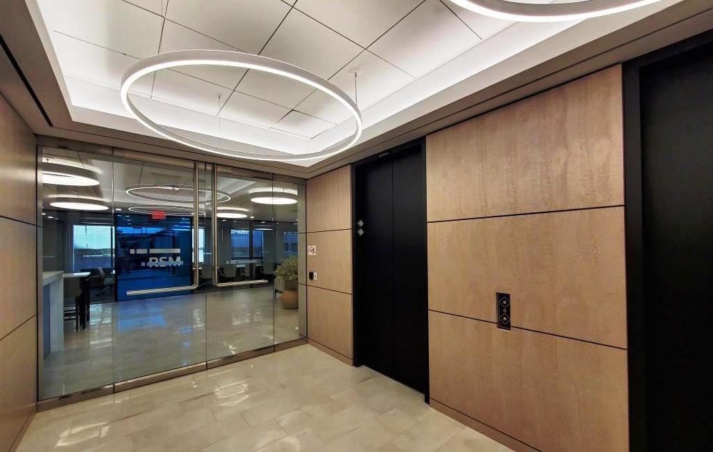 Office elevator lobby matches the fit and finish of the RSM leasehold.