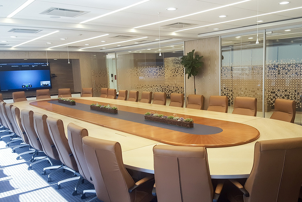 The board meeting table comfortably accommodates up to 30 people at the table plus additional gallery seating. The space is fully outfitted for teleconferencing as well as multi-media audio and visual presentations. 