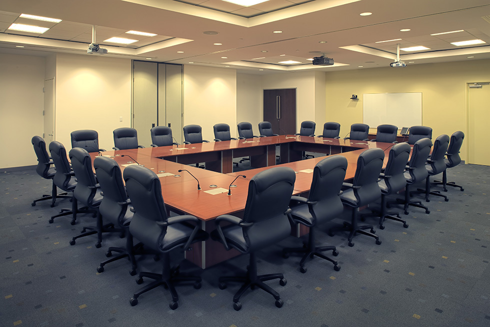 The reconfigurable flex-use conference room is fully equipped for AV/IT and multi-media presentations