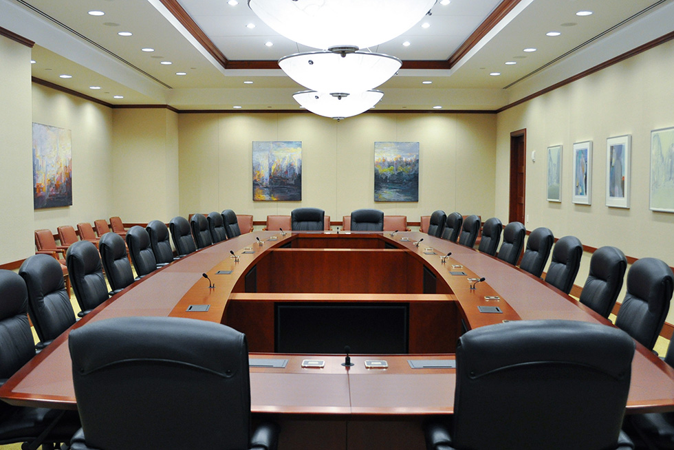 Impressive boardroom table with seating at the table for twenty