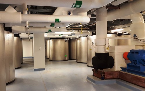 Ice storage tanks located in basement mechanical area are a major component to utility savings