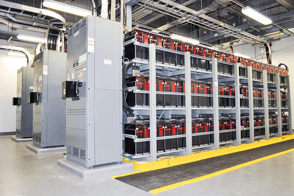 The redundant UPS and batteries are located in separate rated compartmentalized rooms. They are also compartmentalized by system and floor