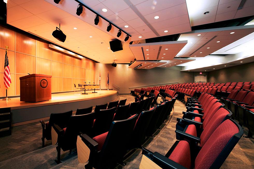 The auditorium was developed with a robust IT and A/V infrastructure and features comfortable plush theatre seating