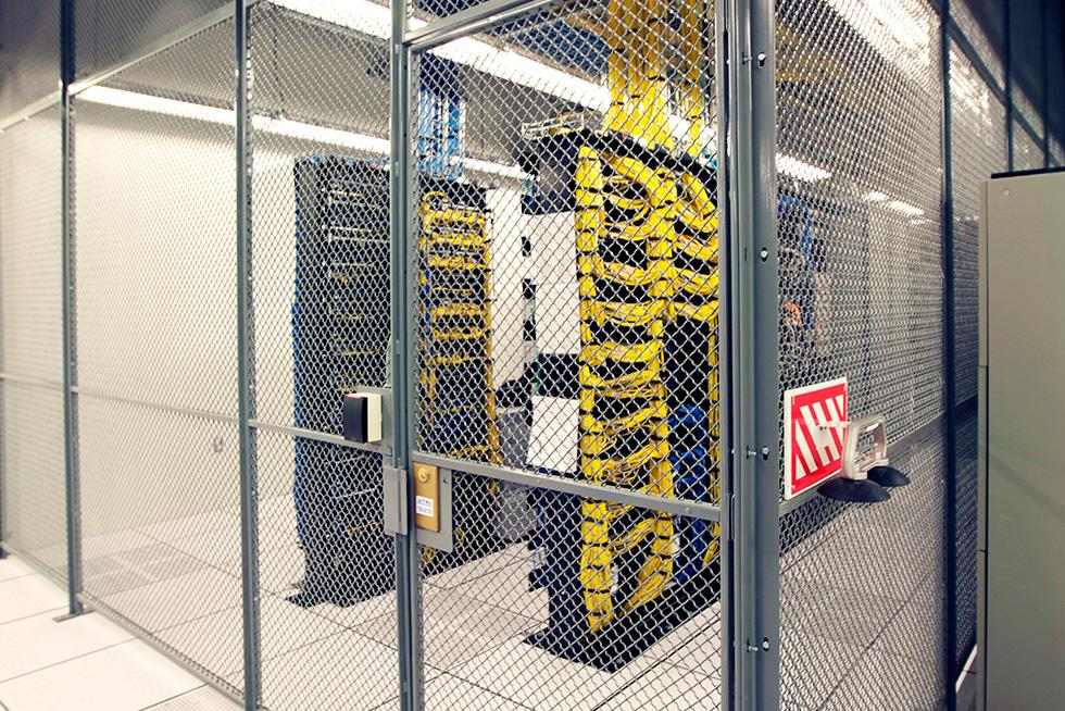Critical equipment within the secure data center resides within locked caged areas