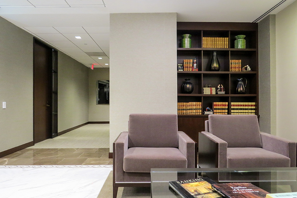 The entry lobby includes a comfortable seating area for waiting or an informal meeting.